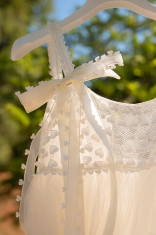 A close-up of the dress showing heart details