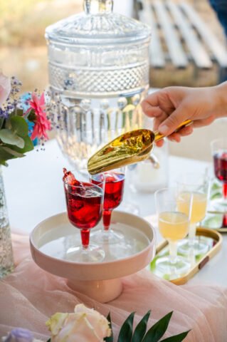 During Christening day, someone is being served a delicious sour-cherry juice with a couple of ice cubes. Best solution to a hot day in Preveza
