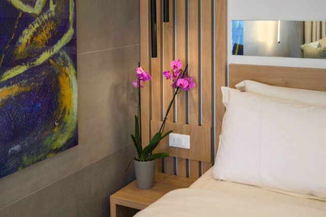 Modern bedroom with walk-in glass shower and wonderful views of Parga, Greece